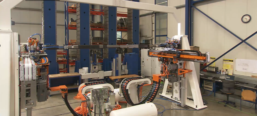 An image of a Linear Automation cross bar style transfer system being manufactured, not installed on a press.